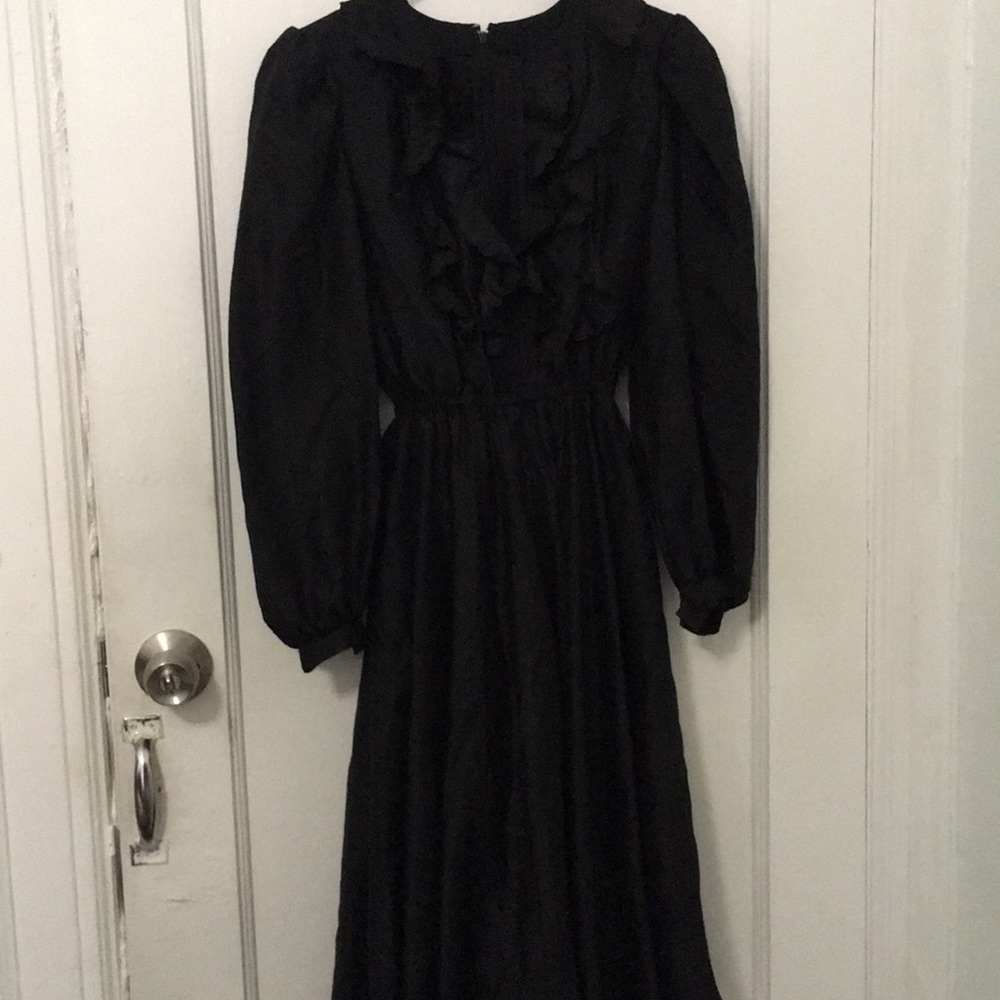 Vintage black ruffle dress.